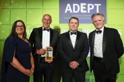 2024 ADEPT Awards - image of people holding an award, dressed for a black tie dinner