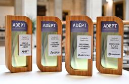 image of 4 ADEPT President's Awards trophies in wood and glass